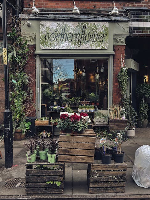The image depicts the storefront of 'northernflower,' a florist shop on Westow Hill Norwood Road Gipsy Hill, with a rustic, inviting exterior featuring a large glass window displaying an array of flor