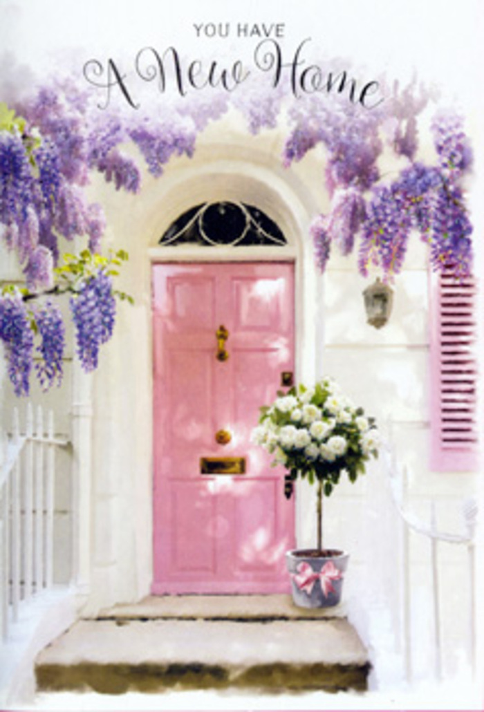 In this evocative scene, the entrance appears as if it could be part of a tucked-away street near Gipsy Hill station, where residents take pride in their front steps and doorway displays. The focal point is a painted pink front door, bathed in gentle, natural light that gives the surface a calm, almost velvety sheen. Its colour sits beautifully between blush and dusty rose, conveying warmth without shouting for attention. Surrounding the door, whitewashed walls provide a bright, neutral canvas, their slightly mottled texture working with the light to create subtle variations in tone. A pale shutter, painted in a coordinating hue, extends the pink theme in a quiet, deliberate whisper. Draped above the door and trailing down along the frame, wisteria blooms fall in profuse, fragrant curtains. Their petals cluster together in cascading racemes, shading from whitish lavender at the top through to deeper mauve and lilac towards the tips, evoking that familiar springtime abundance you might notice walking up the hill towards Crystal Palace. On the doorstep itself, a rounded grey metal bucket forms a modest yet stylish container for a luxurious floral arrangement. Inside, tightly packed white and cream roses spill upwards and outwards, their velvety petals opening in perfect concentric layers. Between them, pieces of soft green foliage curl and dance, adding detail and a hint of garden freshness, as if snipped moments ago from a local back garden near West Norwood. A soft, satin pink ribbon is tied with care around the bucket's base, its colour reflecting both the roses' warmth and the door's gentle blush. The overall feeling is one of serene celebration-a floral tableau that perfectly suits a new home blessing, a thoughtful congratulations, or a gentle message of support for someone creating a new start in Gipsy Hill, with each bloom quietly promising comfort, beauty, and a welcoming sense of place.